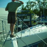 Chris enacting the 'land-ho' but appears to me that he is saluting s/v Alchemy's new look...